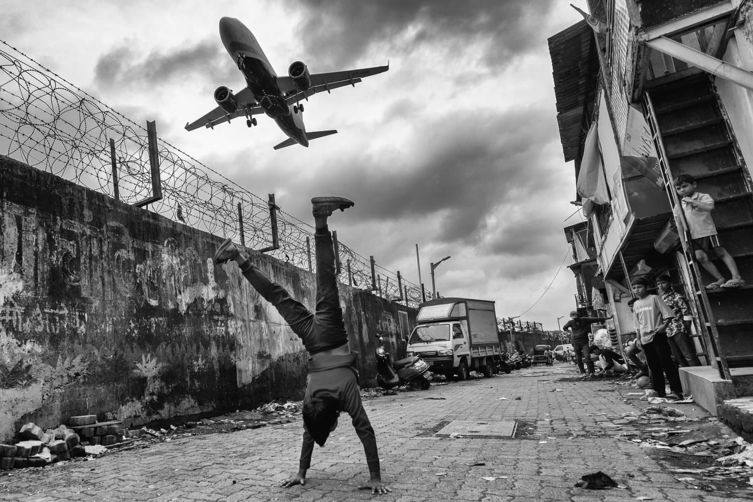 Black and White Photo Awards 2025 - Street Silver Mention - Define the gravity together , by Sanghamitra Sarkar